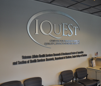 IQuest Logo on Office Wall